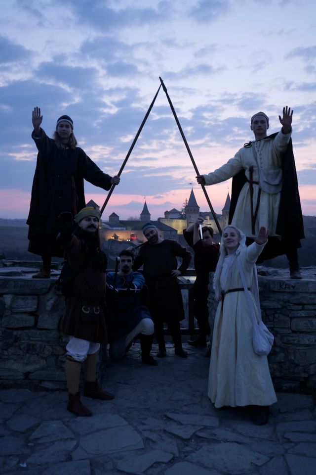 A fortress at dusk during a living-history event